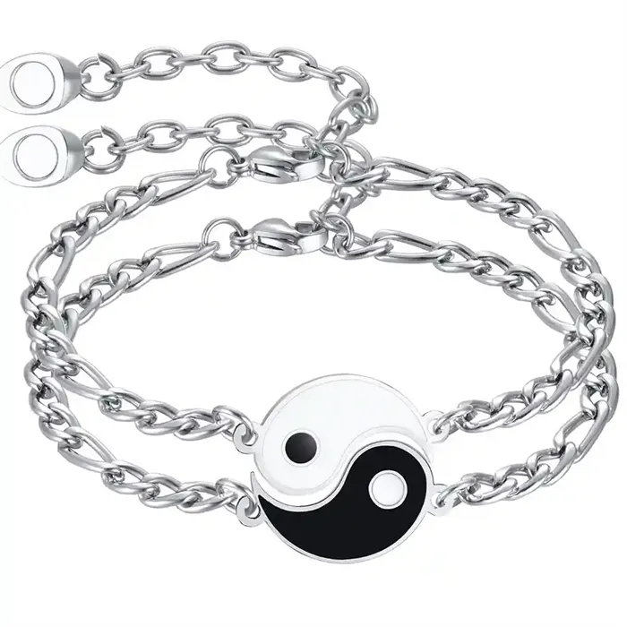 Yin and Yang pararmbånd i rustfri stål.
